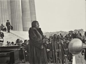 Marian-Anderson-1897-1993-African-American-contralto-singing-at-the-Lincoln-Memorial-Washington-Easter-Sunday-1939-scaled This photo appears to be that of Marian Anderson singing at the Lincoln Memorial on Easter Sunday 1939.